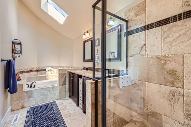 7445 Shoreham Pl, Castle Pines, CO 80108 - bathroom featuring a bath, a skylight, vanity, a tile shower, and high vaulted ceiling