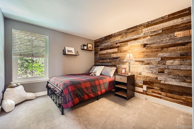 7445 Shoreham Pl, Castle Pines, CO 80108 - bedroom with wooden walls, carpet floors, and an accent wall