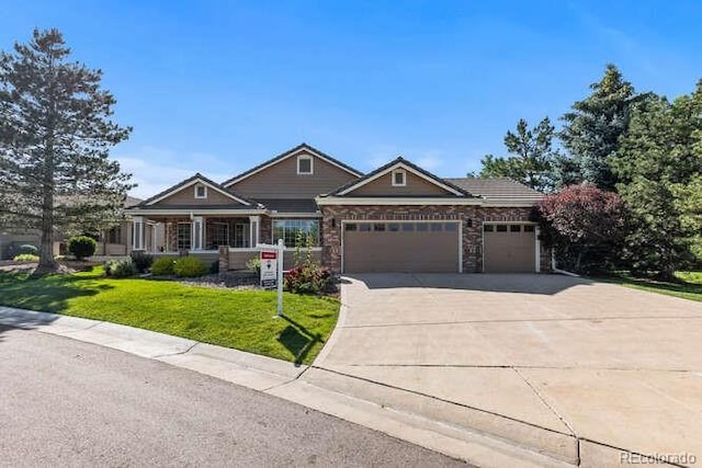 9561 Silver Hill Cir, Lone Tree, CO 80124 - craftsman-style house with a garage, a front lawn, and driveway