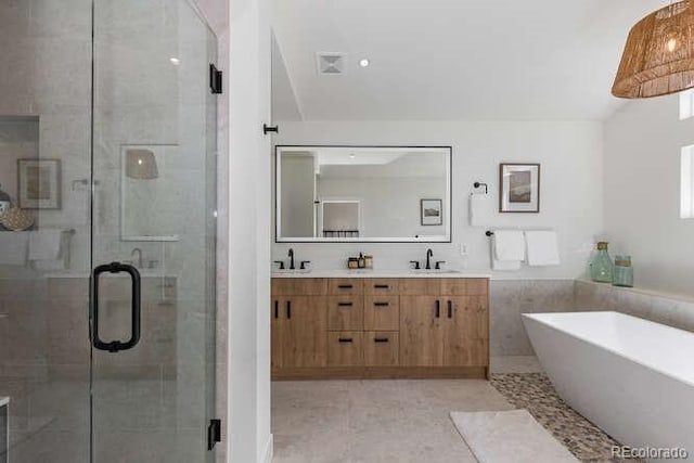 9561 Silver Hill Cir, Lone Tree, CO 80124 - full bathroom with a freestanding tub, double vanity, and a shower stall