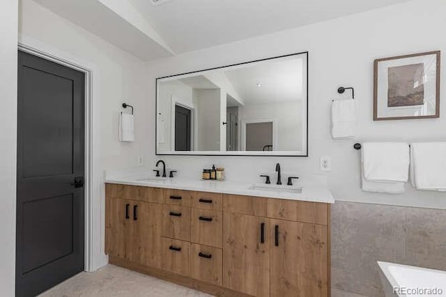 9561 Silver Hill Cir, Lone Tree, CO 80124 - bathroom featuring double vanity and a freestanding bath