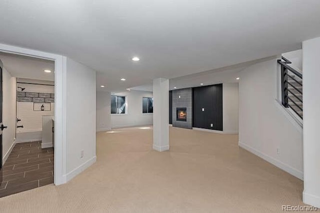 9561 Silver Hill Cir, Lone Tree, CO 80124 - below grade area featuring light carpet and recessed lighting