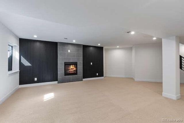 9561 Silver Hill Cir, Lone Tree, CO 80124 - below grade area featuring carpet, a tile fireplace, and recessed lighting