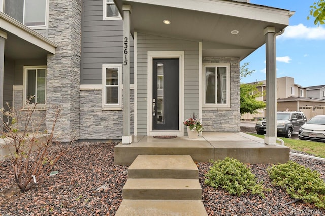 23615 E 5th Pl, Aurora, CO 80018 - property entrance featuring stone siding