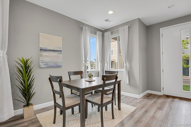 23615 E 5th Pl, Aurora, CO 80018 - dining area featuring light wood-style floors, baseboards, and recessed lighting