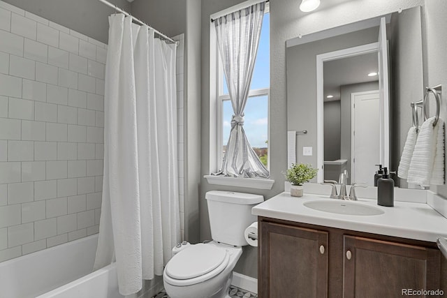 23615 E 5th Pl, Aurora, CO 80018 - full bathroom with toilet, vanity, and shower / bath combo with shower curtain