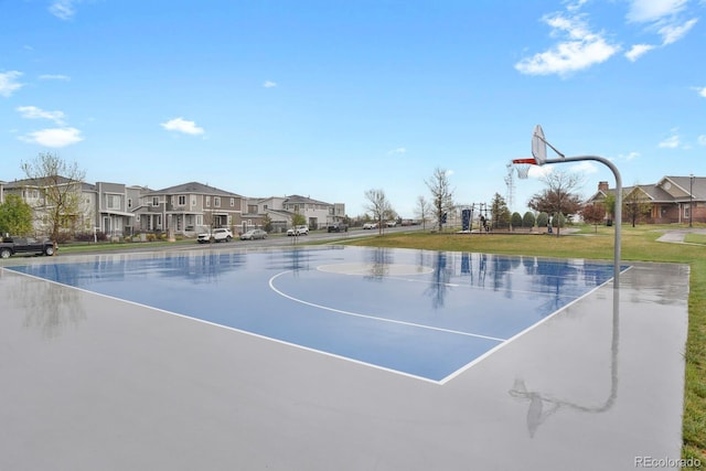 23615 E 5th Pl, Aurora, CO 80018 - view of basketball court with community basketball court, a residential view, and a yard