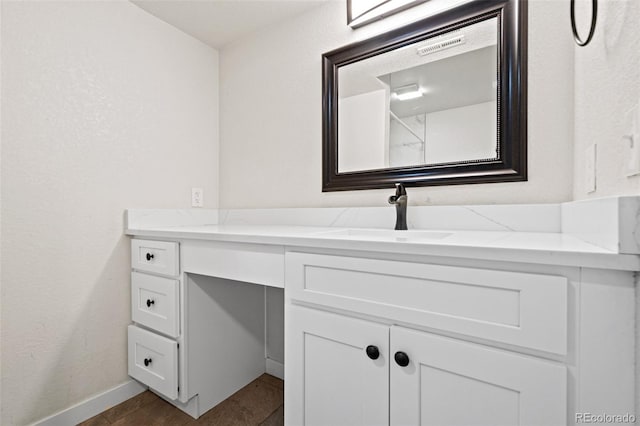 bathroom featuring vanity and tile patterned floors