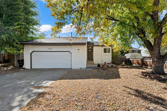 ranch-style home with a garage