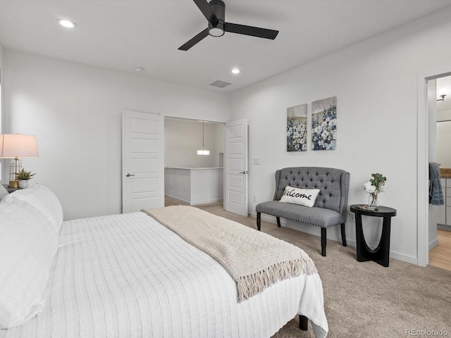 11719 W 45th Pl, Wheat Ridge, CO 80033 - bedroom with light carpet, recessed lighting, a ceiling fan, baseboards, and a closet