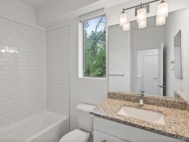 11719 W 45th Pl, Wheat Ridge, CO 80033 - bathroom with vanity, toilet, and bathtub / shower combination