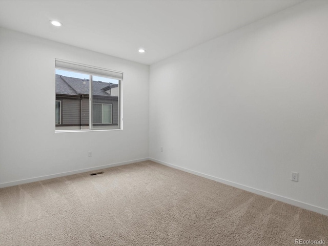 11719 W 45th Pl, Wheat Ridge, CO 80033 - carpeted empty room with baseboards and recessed lighting
