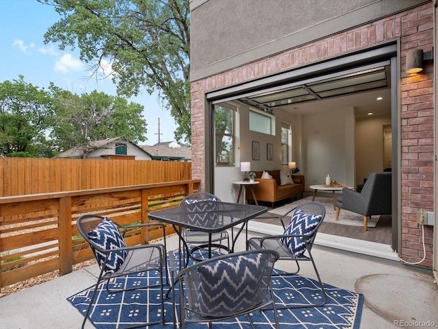 11719 W 45th Pl, Wheat Ridge, CO 80033 - view of patio featuring outdoor dining space