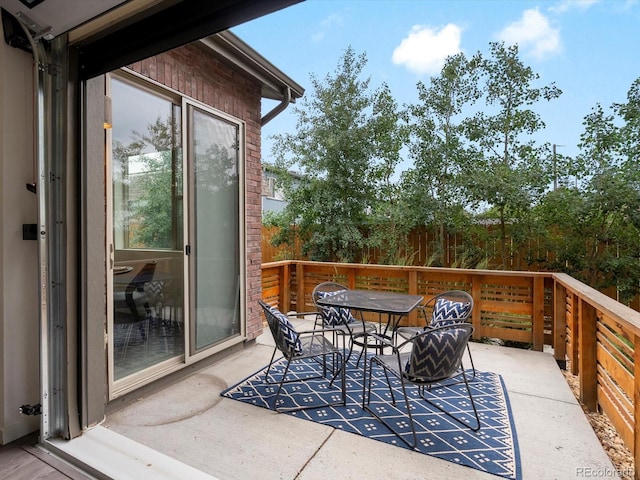 11719 W 45th Pl, Wheat Ridge, CO 80033 - view of patio / terrace featuring a deck and outdoor dining space