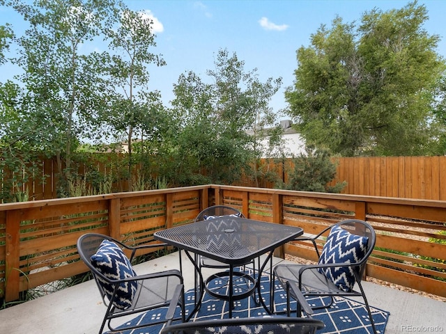 11719 W 45th Pl, Wheat Ridge, CO 80033 - wooden deck with outdoor dining space