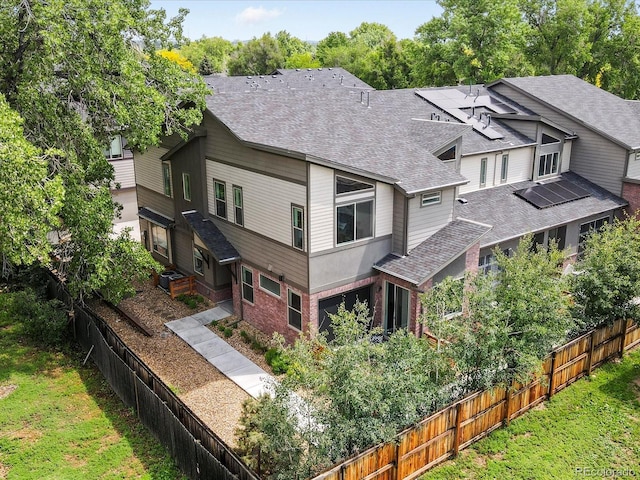 11719 W 45th Pl, Wheat Ridge, CO 80033 - view of home's exterior with roof with shingles