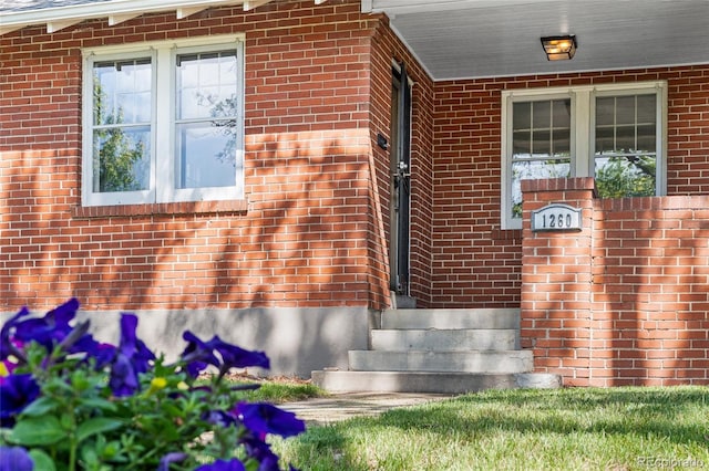 1260 S Emerson St, Denver, CO 80210 - doorway to property with brick siding