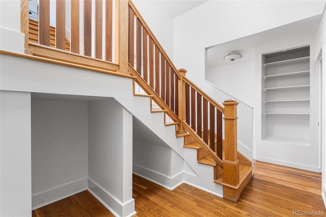 1260 S Emerson St, Denver, CO 80210 - staircase with wood-type flooring and baseboards