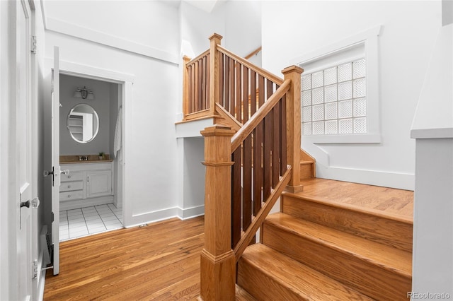 1260 S Emerson St, Denver, CO 80210 - stairs with wood finished floors and baseboards