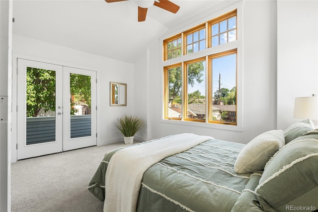 1260 S Emerson St, Denver, CO 80210 - carpeted bedroom with access to exterior, lofted ceiling, multiple windows, french doors, and ceiling fan