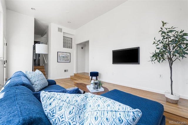 1260 S Emerson St, Denver, CO 80210 - living room featuring wood finished floors and baseboards