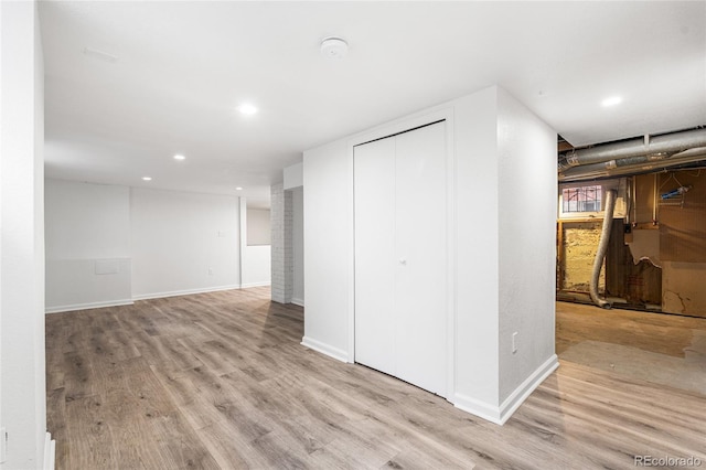 1260 S Emerson St, Denver, CO 80210 - finished below grade area featuring wood finished floors, baseboards, and recessed lighting