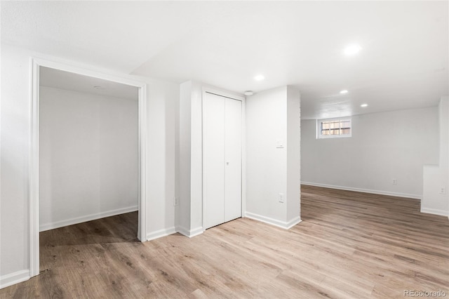 1260 S Emerson St, Denver, CO 80210 - below grade area with wood finished floors, recessed lighting, and baseboards