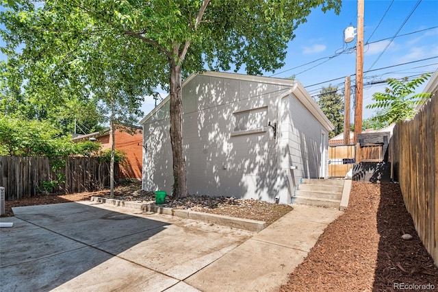 1260 S Emerson St, Denver, CO 80210 - view of outdoor structure with a fenced backyard