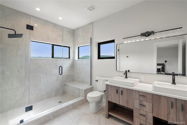 378 E Agate Unit 1B, Granby, CO 80446 - bathroom featuring double vanity, a stall shower, tile patterned flooring, and recessed lighting