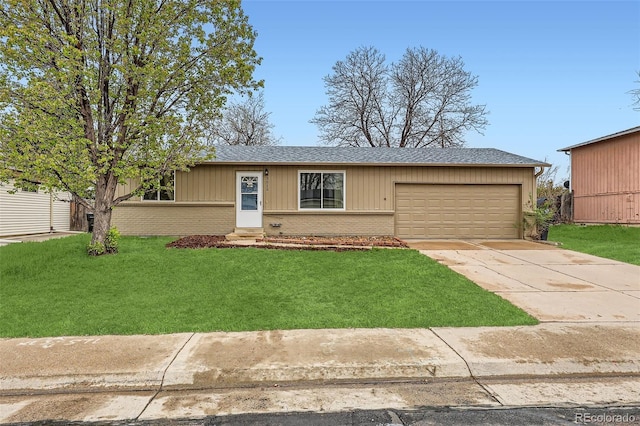 3512 E 117th Pl, Thornton, CO 80233 - ranch-style house featuring an attached garage, brick siding, concrete driveway, and a front yard