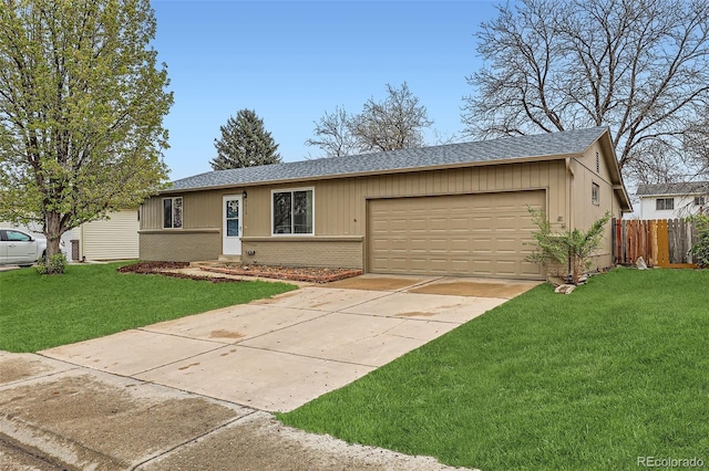 3512 E 117th Pl, Thornton, CO 80233 - single story home with brick siding, a garage, roof with shingles, and driveway