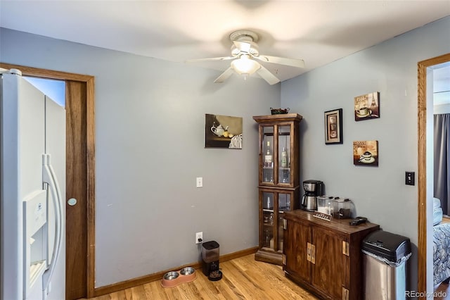 3512 E 117th Pl, Thornton, CO 80233 - hallway featuring light wood finished floors and baseboards
