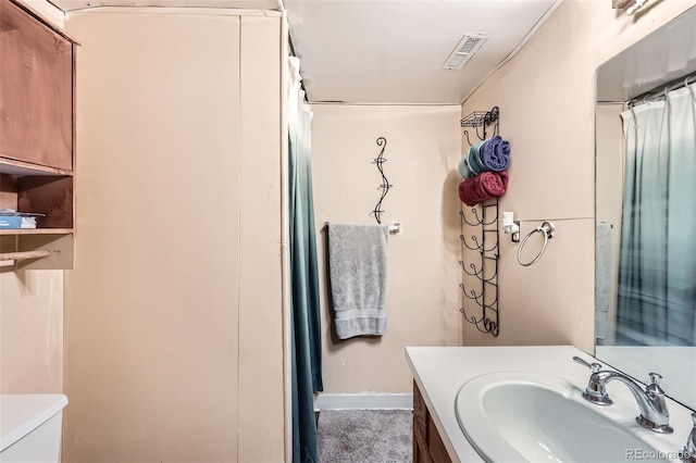 3512 E 117th Pl, Thornton, CO 80233 - full bath with vanity, toilet, and baseboards