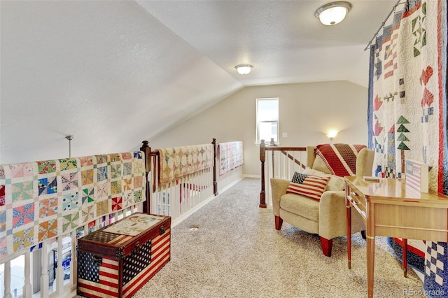 9046 Sandpiper Dr, Frederick, CO 80504 - sitting room featuring vaulted ceiling, carpet, a textured ceiling, and baseboards