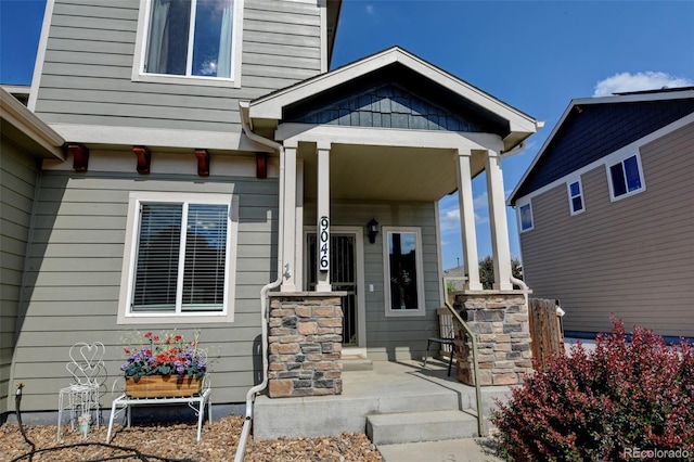 9046 Sandpiper Dr, Frederick, CO 80504 - doorway to property with a porch