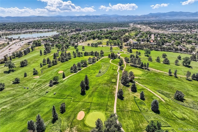 drone / aerial view with a water and mountain view