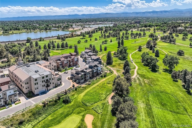 drone / aerial view with a water and mountain view