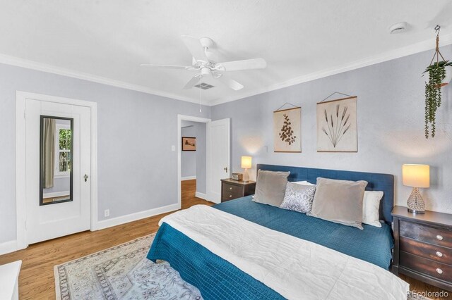 1300 Cherry St, Denver, CO 80220 - bedroom featuring wood finished floors, baseboards, crown molding, and ceiling fan