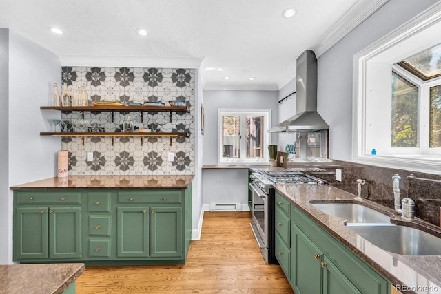 1300 Cherry St, Denver, CO 80220 - kitchen featuring wall chimney range hood, stainless steel range, green cabinets, plenty of natural light, and ornamental molding