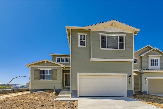4114 Estrella St, Brighton, CO 80601 - view of front facade featuring an attached garage and driveway