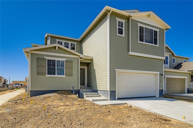 4114 Estrella St, Brighton, CO 80601 - view of front of home with a garage and driveway