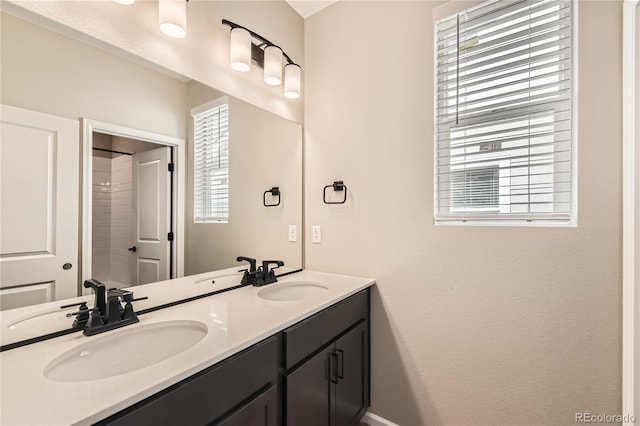 4114 Estrella St, Brighton, CO 80601 - full bathroom featuring double vanity