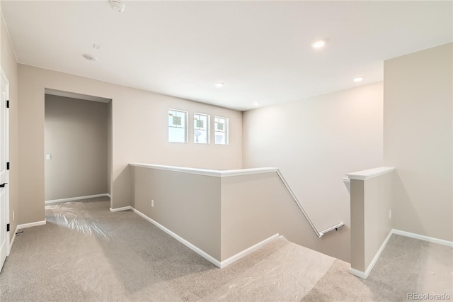 4114 Estrella St, Brighton, CO 80601 - hall with an upstairs landing, carpet flooring, and recessed lighting