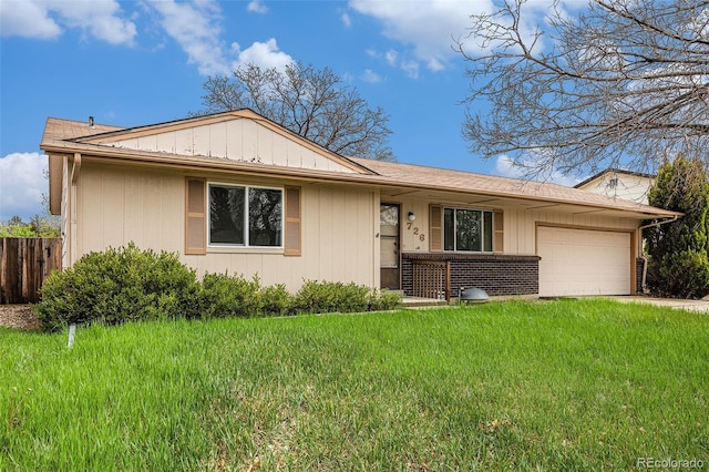 726 Mobile St, Aurora, CO 80011 - ranch-style house featuring an attached garage and driveway