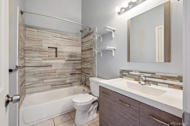 9679 W Chatfield Ave Unit C, Littleton, CO 80128 - full bathroom featuring toilet, vanity, bathtub / shower combination, and tile patterned flooring