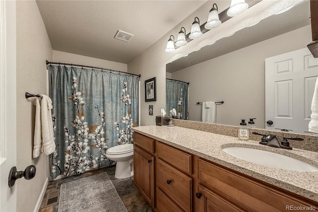 13642 Wrangler Way, Mead, CO 80542 - full bath featuring vanity, stone finish floors, and curtained shower