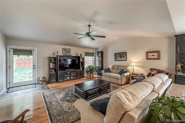 13642 Wrangler Way, Mead, CO 80542 - living area with a ceiling fan, lofted ceiling, and light wood-type flooring