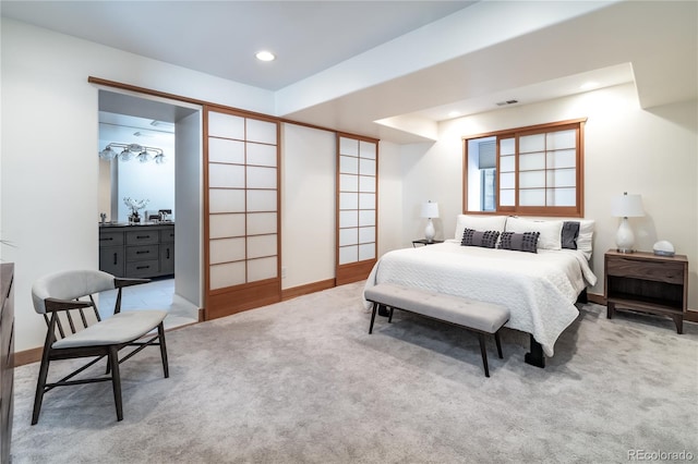 bedroom with recessed lighting, light colored carpet, visible vents, and baseboards