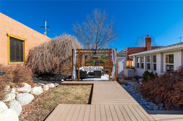 wooden deck with a pergola