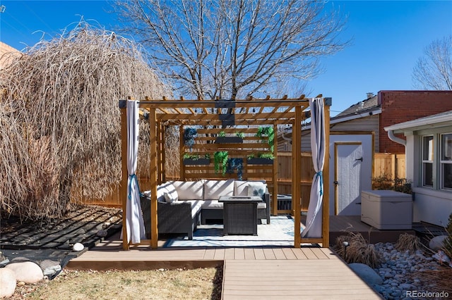 deck featuring fence and an outdoor hangout area